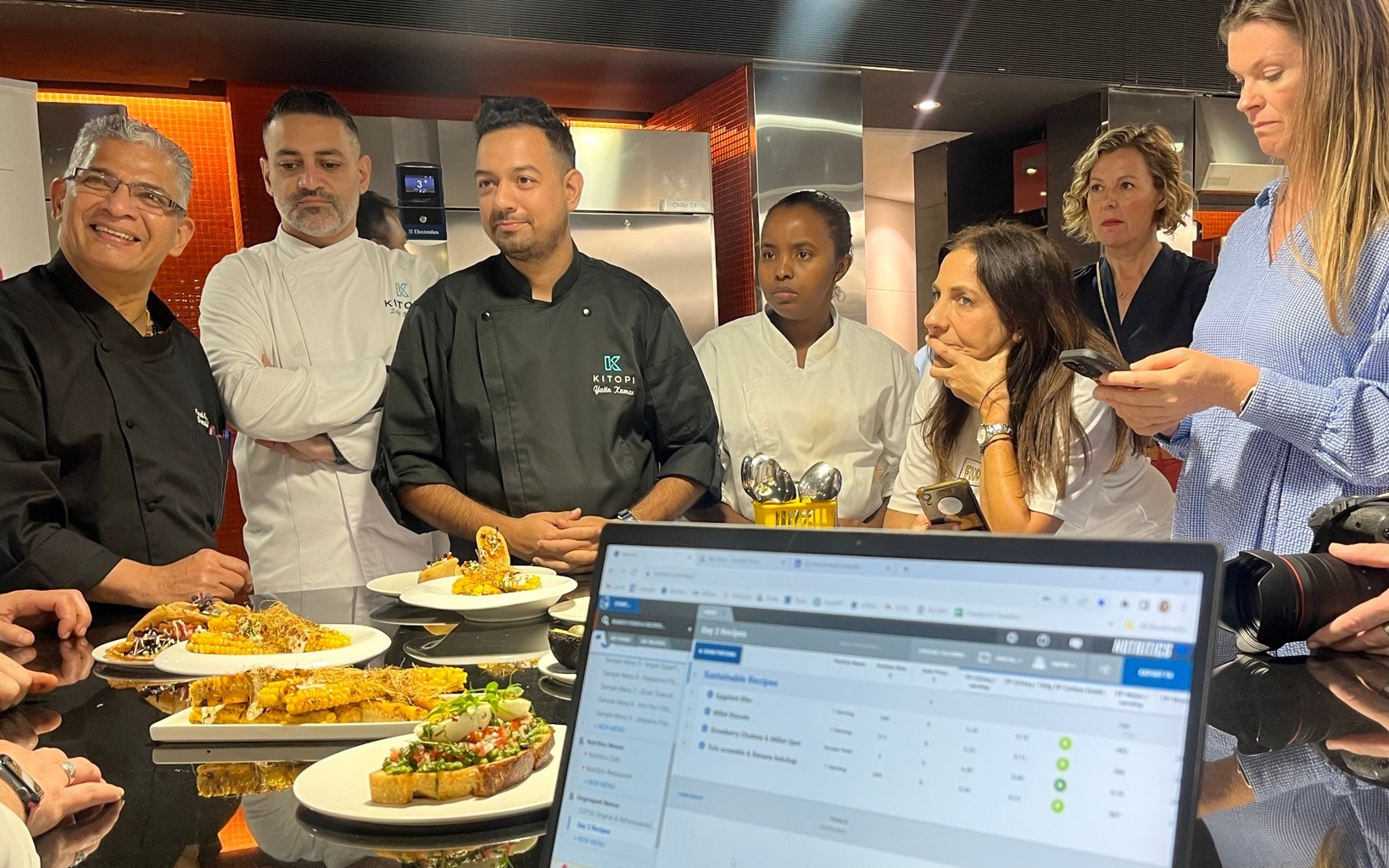 Chefs participating in training at Climate Conscious Catering Workshop using Nutritics.