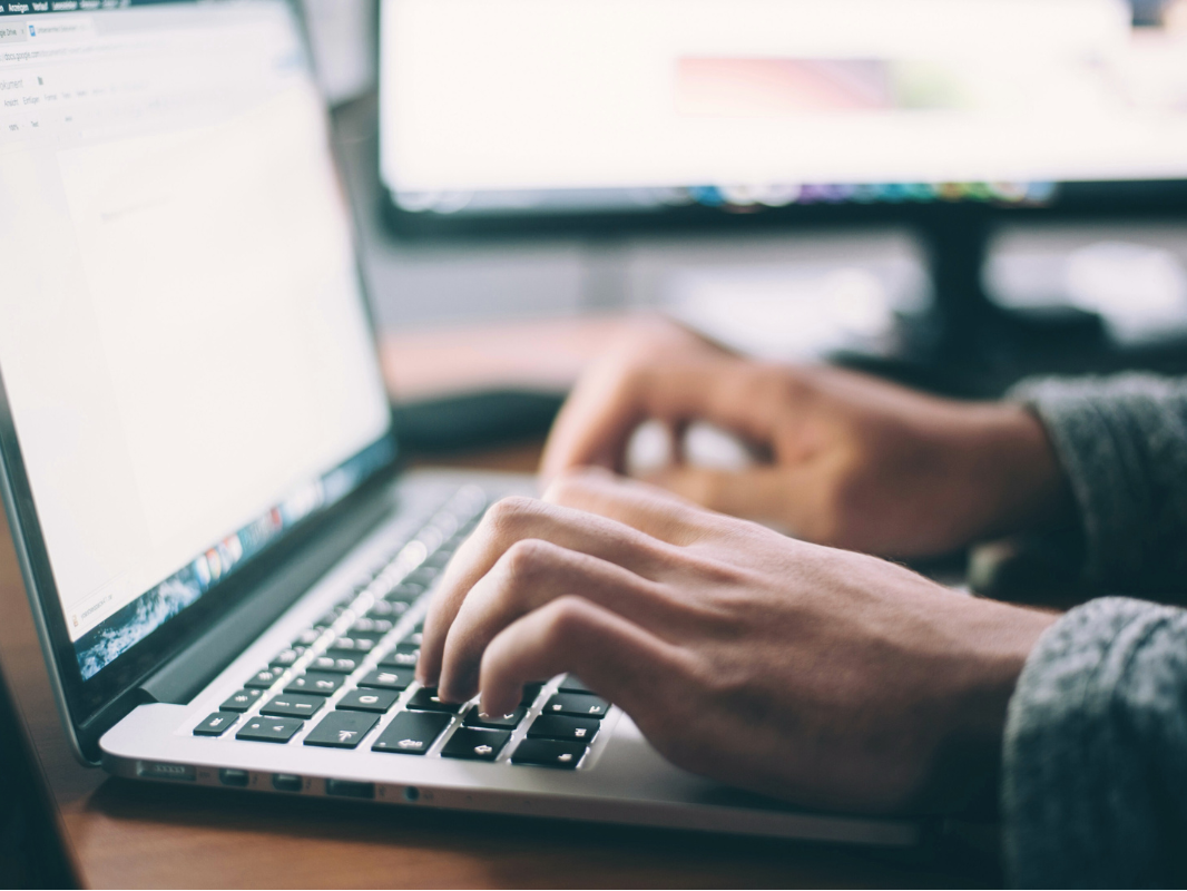 person using laptop