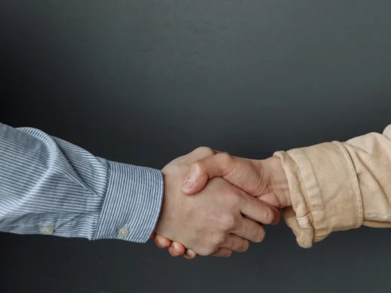 two people shaking hands