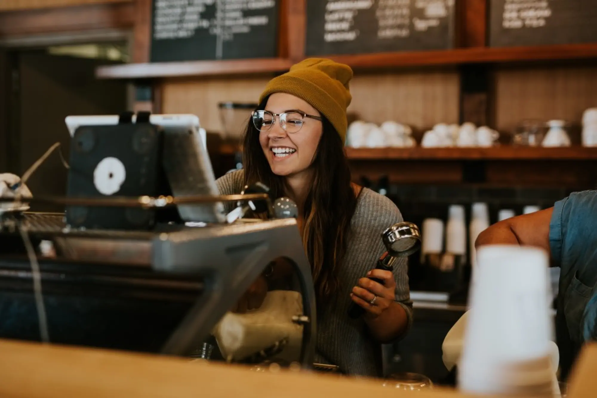 woman smiling in cafe